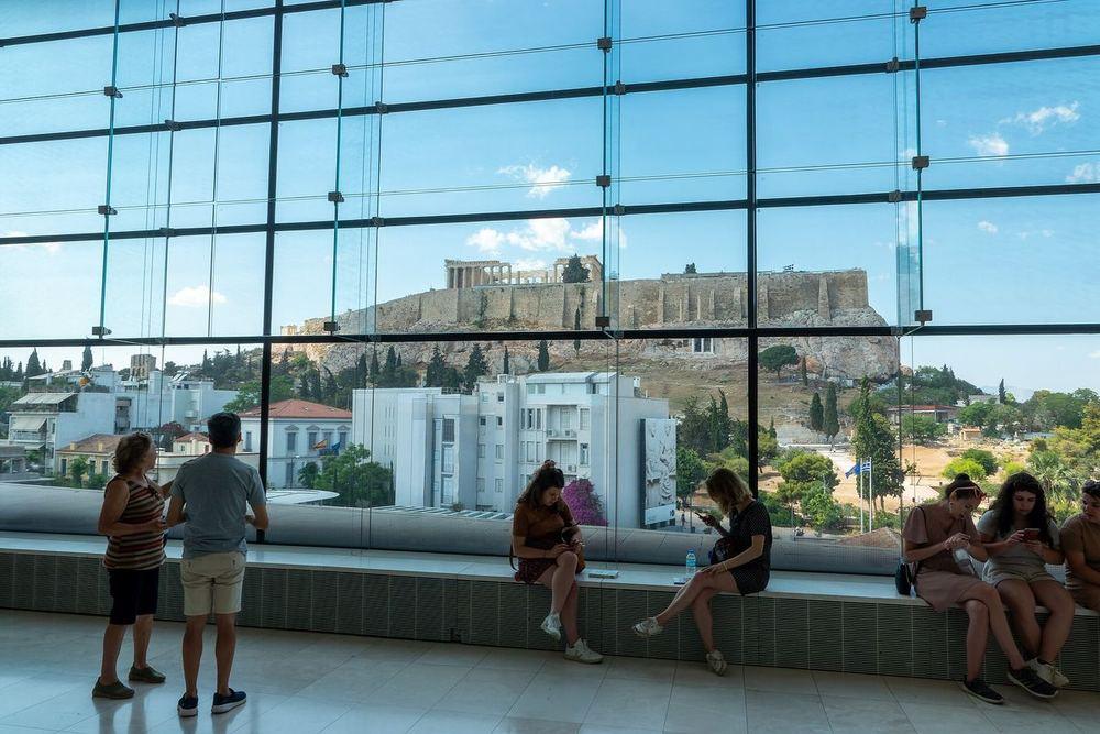 The Parthenon Gallery on the museum's top floor, its glass wall looking straight across at the Acropolis
