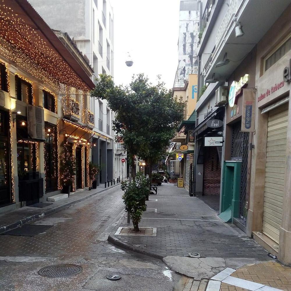 A lane in the Psyrri neighborhood lined with tavernas and bars