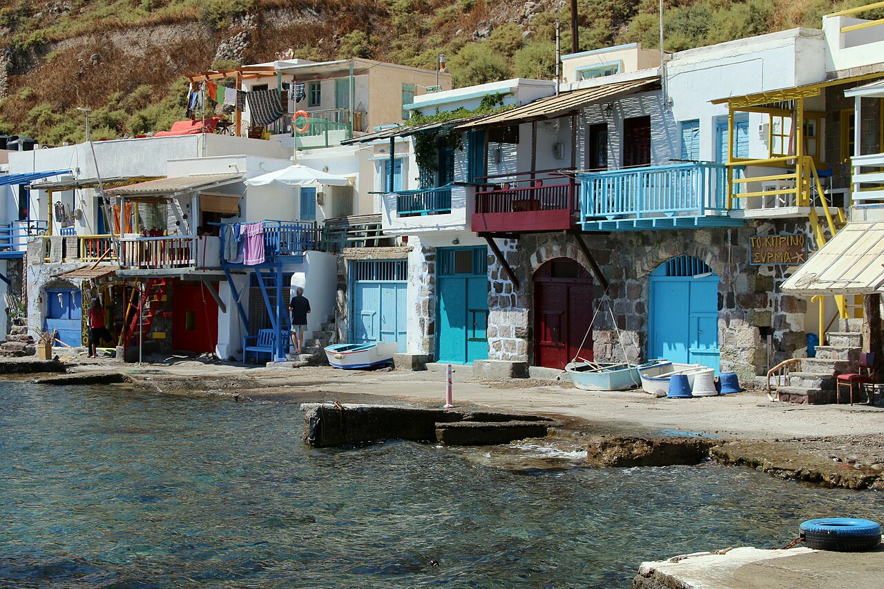 Syrmata at Klima on Milos, two-storey fishermen's houses with brightly painted doors opening straight onto the water