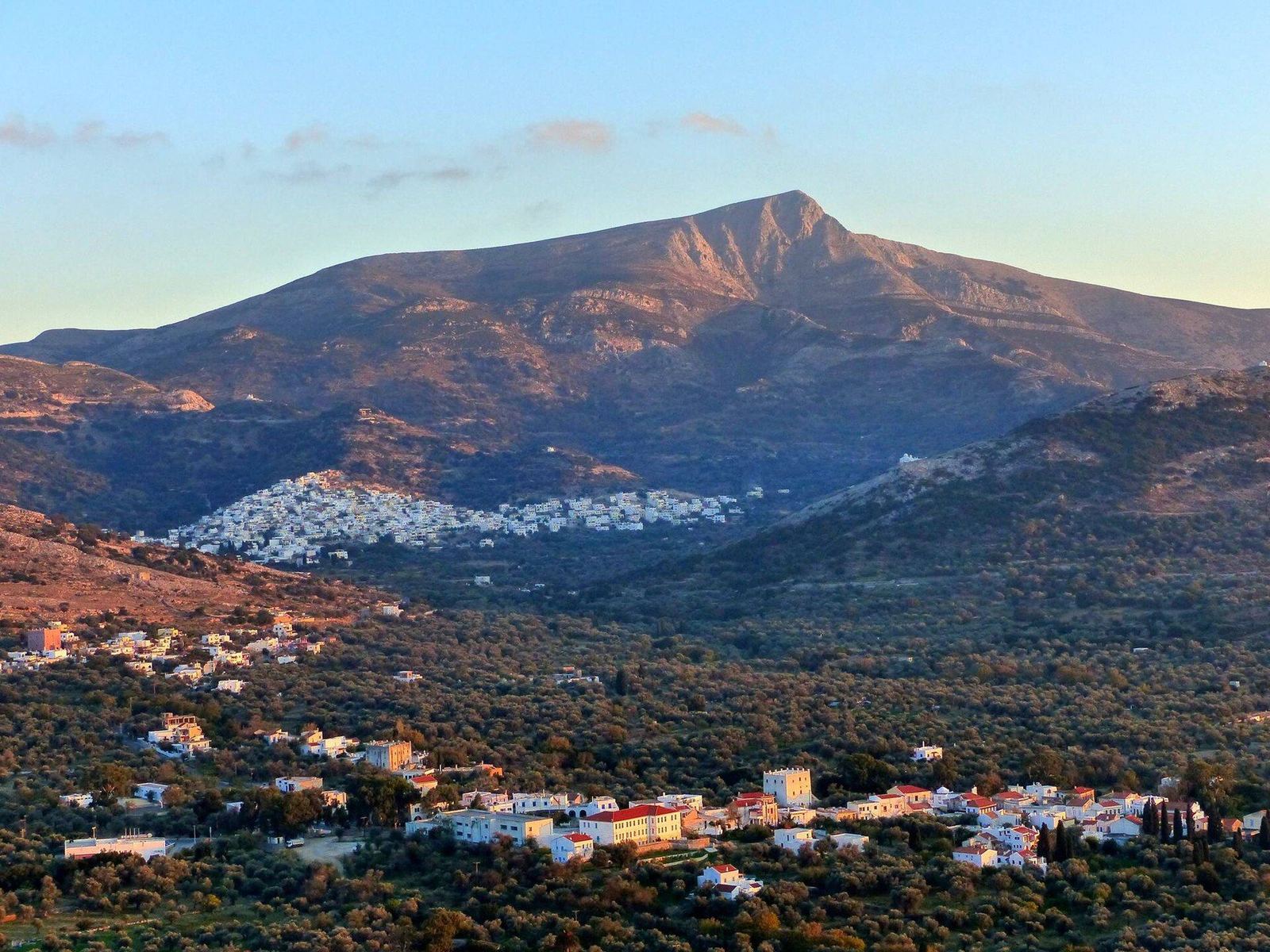 The Tragaia valley at golden hour: olive groves, the village of Halki and Mount Zas behind